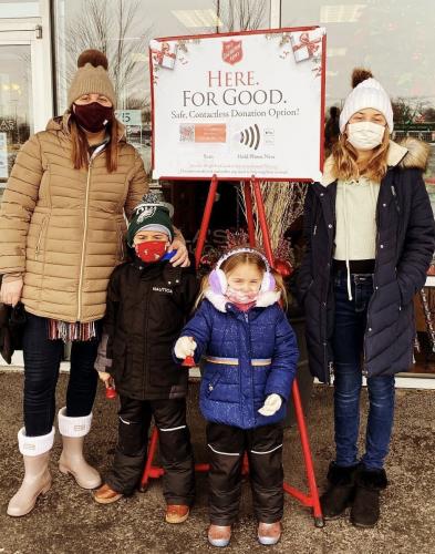 2021 Salvation Army Red Kettle Campaign.Rotary family bell ringers